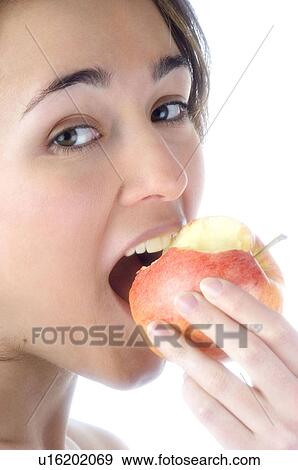Woman, Beauty, Smiling, Fruit, Apple, Mouth, Face View Large Photo Image Stock Photo - Woman, Beauty, Smiling, Fruit, Apple, Mouth, Face. Fotosearch