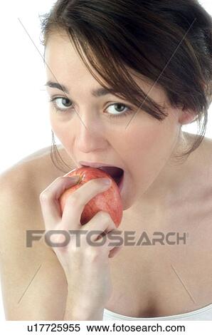 Stock Photography - Woman, Beauty, Smiling, Fruit, Apple, Mouth, Face. Fotosearch