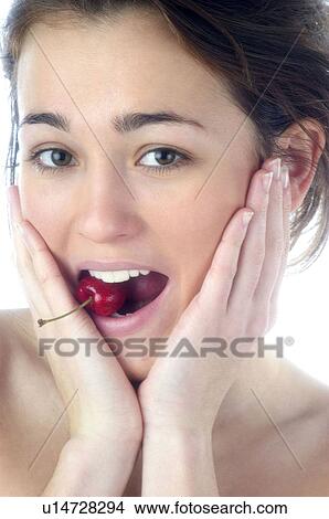 Picture - Woman, Beauty, Smiling, Fruit, Cherry, Red. Fotosearch