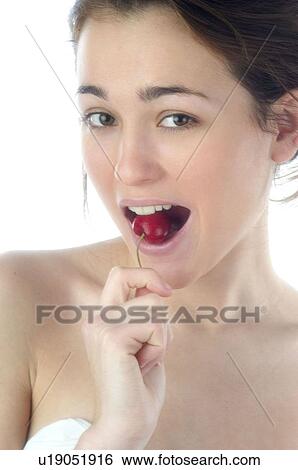Stock Photograph - Woman, Beauty, Smiling, Fruit, Cherry, Red. Fotosearch