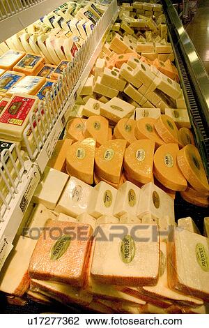 Stock Image - Display of cheese. Fotosearch