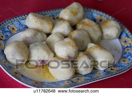 Stock Photo - Polish potato dumplings fruit filled. Fotosearch
