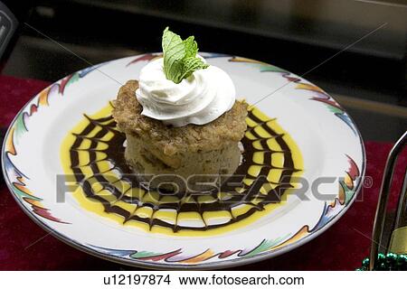 Picture - Bread pudding on fancy plate. Fotosearch