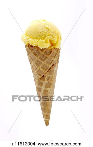 A scoop of mango ice cream in an ice cream cone View Large Photo Image Picture - A scoop of mango ice cream in an ice cream cone. Fotosearch