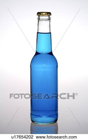 Blue cocktail in a glass bottle, still life View Large Photo Image Stock Image - Blue cocktail in a glass bottle, still life. Fotosearch