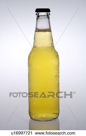 Stock Image - Bottle of cold beer, unopened. Fotosearch