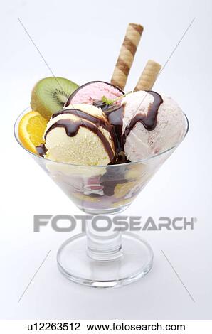 Glass of Dessert, made with ice cream, cookies, and fruit View Large Photo Image Stock Image - Glass of Dessert, made with ice cream, cookies, and fruit. Fotosearch