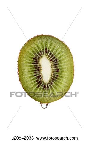 Stock Image - Cross-section of a fresh green kiwi fruit. Fotosearch