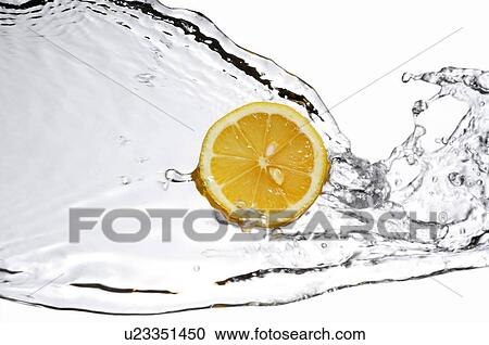 Cross-section of an orange against stream of water View Large Photo Image Stock Image - Cross-section of an orange against stream of water. Fotosearch