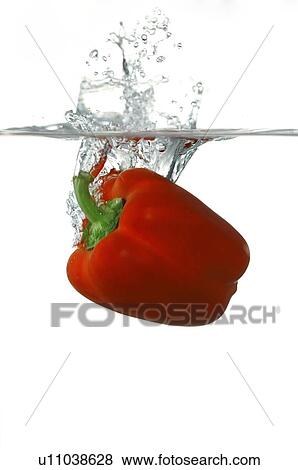 Fresh bell pepper falling into water View Large Photo Image Stock Photo - Fresh bell pepper falling into water. Fotosearch