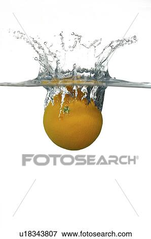 Stock Photo - Orange splashing into water. Fotosearch