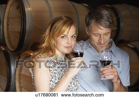 Couple drinking red wine View Large Photo Image Stock Image - Couple drinking red wine. Fotosearch