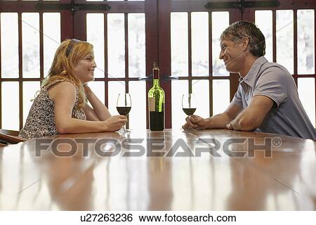 Couple drinking red wine View Large Photo Image Stock Photograph - Couple drinking red wine. Fotosearch