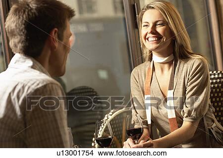 Mid adult couple drinking red wine View Large Photo Image Picture - Mid adult couple drinking red wine. Fotosearch