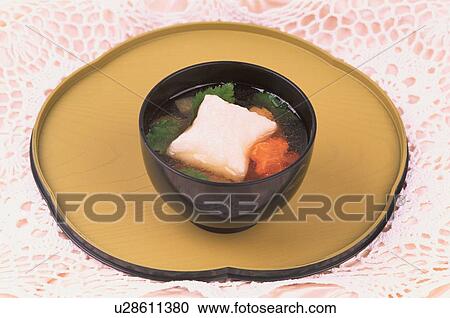 Stock Image - Bowl Of Zoni On Tray. Fotosearch