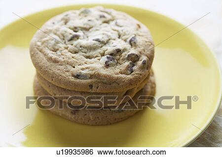 Stock Photograph - Chocolate chip cookies on plate. Fotosearch