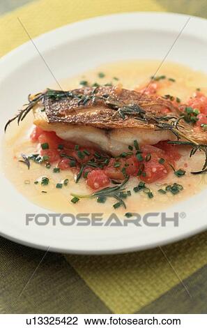Stock Image - Fish Dish With Sauce. Fotosearch