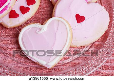 Pink heart shaped cookies (close-up) View Large Photo Image Stock Photography - Pink heart shaped cookies (close-up). Fotosearch