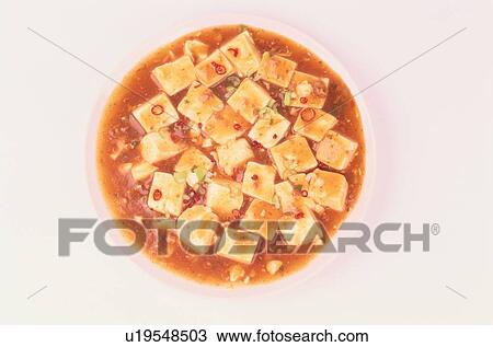 Stock Image - Plate Of Sauce With Tofu. Fotosearch
