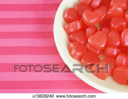 Stock Image - Red Jelly Beans on Plate. Fotosearch