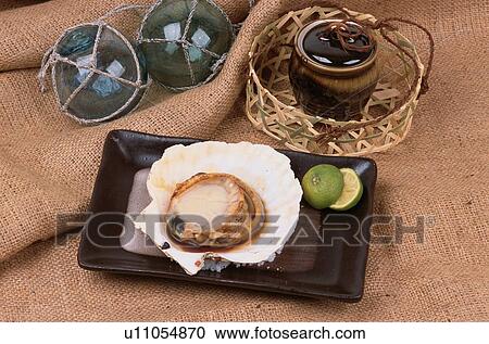 Stock Image - Scallop With Shell On Plate. Fotosearch