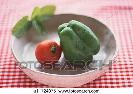 Tomato And Bell Pepper In Bowl View Large Photo Image Stock Photography - Tomato And Bell Pepper In Bowl. Fotosearch