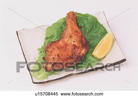 Chicken Thigh With Lemon View Large Photo Image Stock Photography - Chicken Thigh With Lemon. Fotosearch