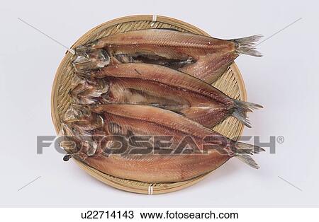 Stock Image - Dried Herrings On Plate. Fotosearch