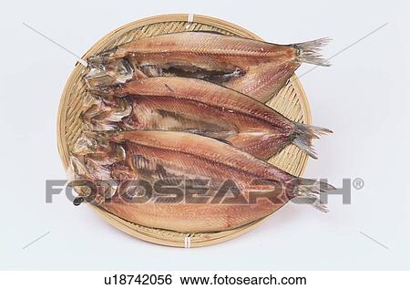Stock Photograph - Dried Herrings On Plate. Fotosearch