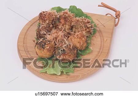 Stock Photo - Octopus Balls On Cutting Board. Fotosearch