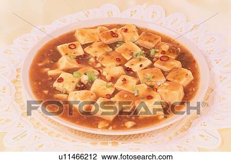 Stock Image - Plate Of Sauce With Tofu. Fotosearch