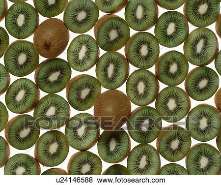 Stock Photo - Rows Of Halved Kiwi Fruits. Fotosearch