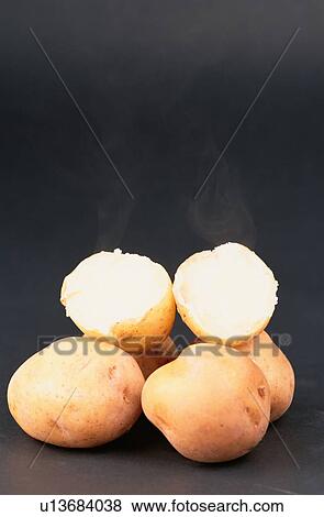 Steaming Potatoes View Large Photo Image Stock Photo - Steaming Potatoes. Fotosearch