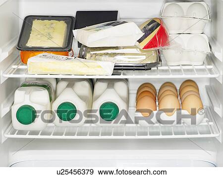 Dairy products in fridge (close-up) View Large Photo Image Stock Photo - Dairy products in fridge (close-up). Fotosearch