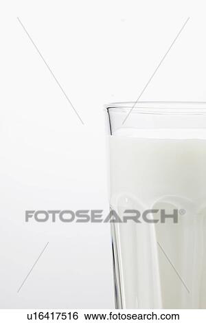 Stock Photograph - Glass of milk (close-up). Fotosearch