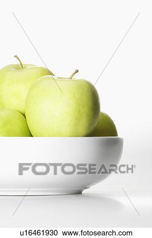 Green apples in bowl (close-up) View Large Photo Image Stock Image - Green apples in bowl (close-up). Fotosearch