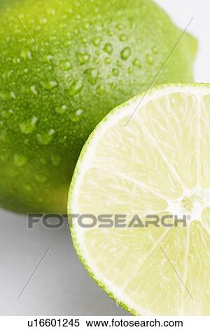 Stock Photography - Lime, sliced in half (close-up). Fotosearch