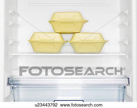 Three take-out boxes in fridge (close-up) View Large Photo Image Stock Image - Three take-out boxes in fridge (close-up). Fotosearch