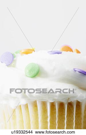 Cake with colorful sprinkles (close-up) View Large Photo Image Picture - Cake with colorful sprinkles (close-up). Fotosearch