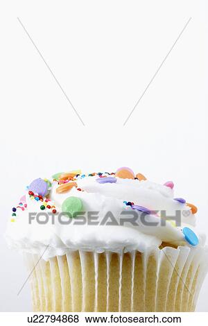 Cake with colorful sprinkles (close-up) View Large Photo Image Stock Photo - Cake with colorful sprinkles (close-up). Fotosearch