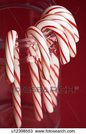 Candy canes in glass jar (close-up) View Large Photo Image Stock Image - Candy canes in glass jar (close-up). Fotosearch