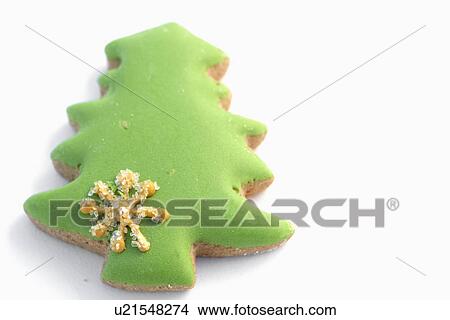 Picture - Christmas tree shaped gingerbread cookie. Fotosearch