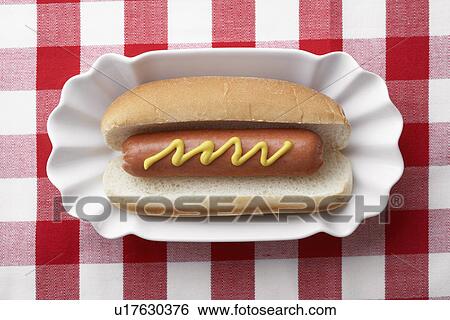 Hot dog on plate View Large Photo Image Stock Photograph - Hot dog on plate. Fotosearch