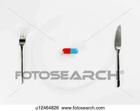 Single pill on white plate (close-up, directly above) View Large Photo Image Stock Photograph - Single pill on white plate (close-up, directly above). Fotosearch