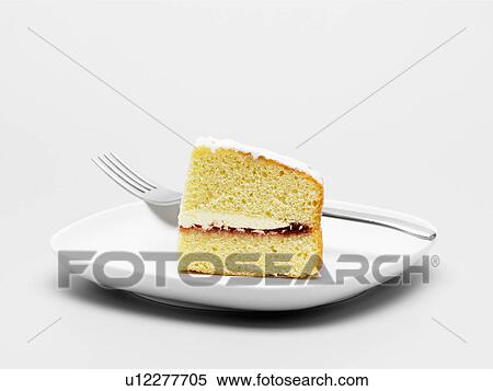 Slice of cake on plate (close-up) View Large Photo Image Stock Photography - Slice of cake on plate (close-up). Fotosearch