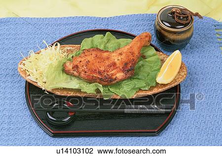 Stock Image - Chicken Thigh And Chopsticks. Fotosearch