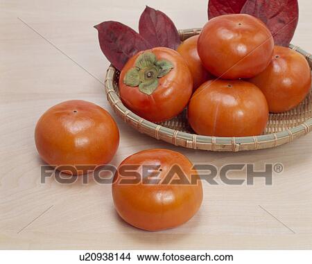 Picture - Persimmons In Bowl. Fotosearch