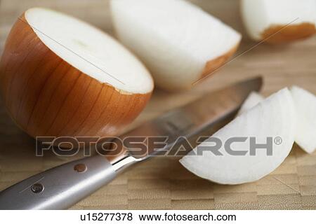 Stock Photo - Knife and onions. Fotosearch