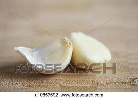 Two garlic gloves View Large Photo Image Stock Image - Two garlic gloves. Fotosearch