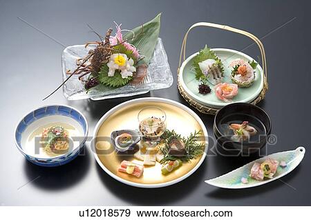 Stock Photo - Various Japanese food, high angle view, black background, Japan. Fotosearch